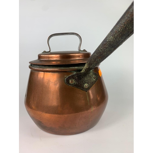 203 - Victorian copper pot with handle. 42cm