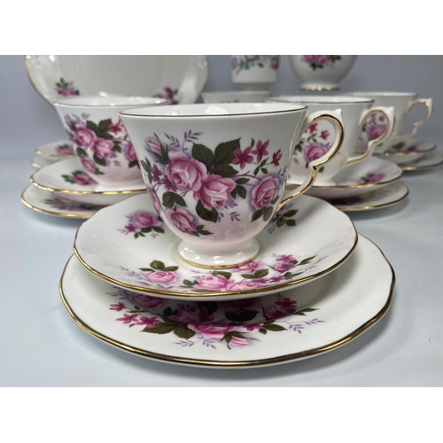 223 - Part Queen Anne tea set with 2 Crown Royal saucers and Royal Grafton sugar container.