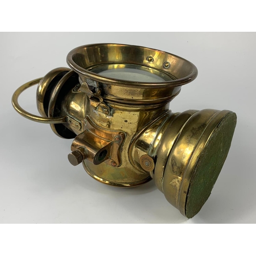 236 - Early 20th century brass lamp for carriage or car. 29cm