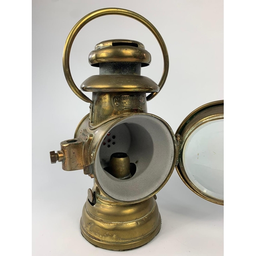 236 - Early 20th century brass lamp for carriage or car. 29cm