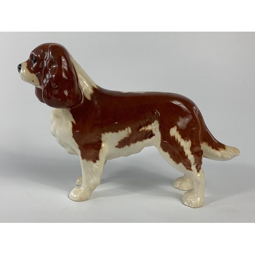 238 - Beswick pottery dog. 20cm.