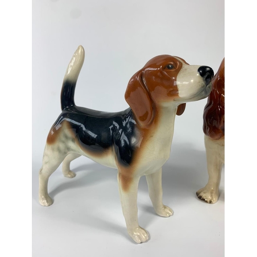 240 - 3 pottery dogs, 1 by Coopercraft. 27cm.