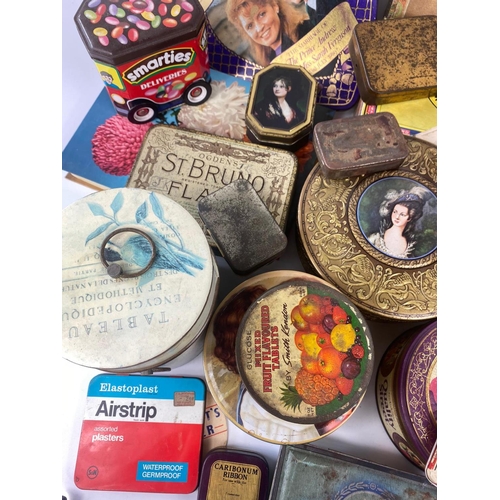 246 - Large quantity of old tins etc