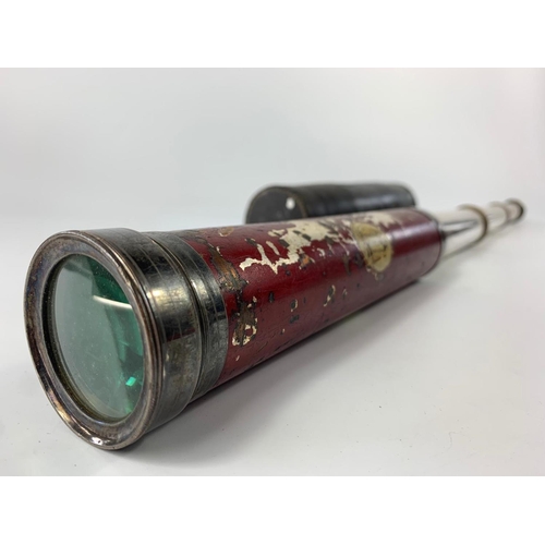 252 - Vintage telescope in leather case. 73cm