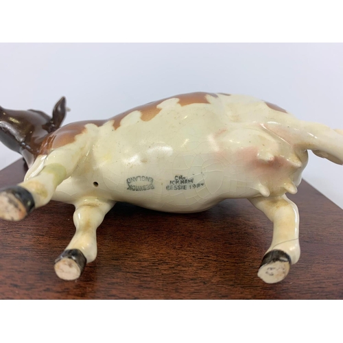 271 - Beswick pottery cow,  cow 16cm