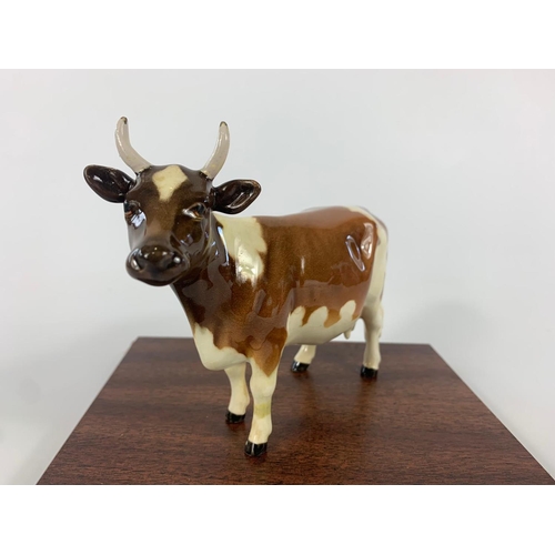 271 - Beswick pottery cow,  cow 16cm