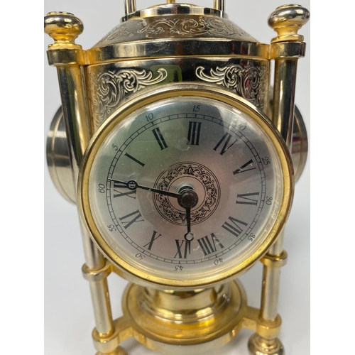 279 - Brass clock barometer and brass table top compass.