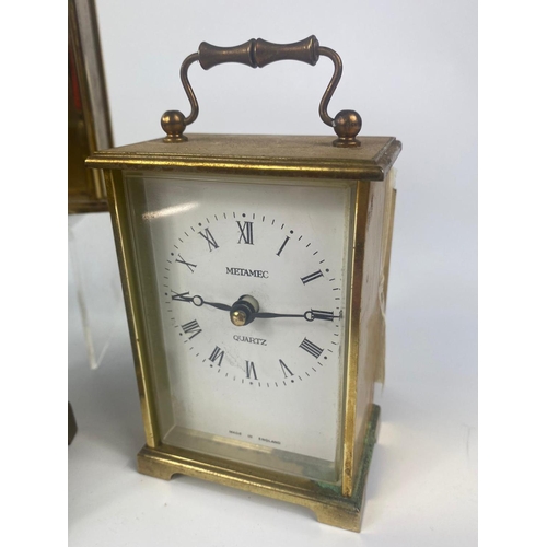 310 - Vintage carriage clock with 4 other modern clocks.