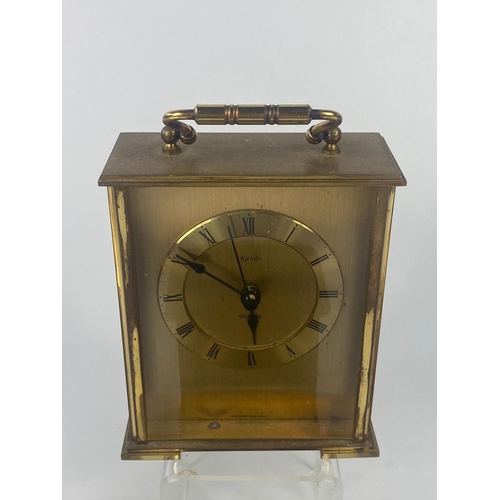 310 - Vintage carriage clock with 4 other modern clocks.