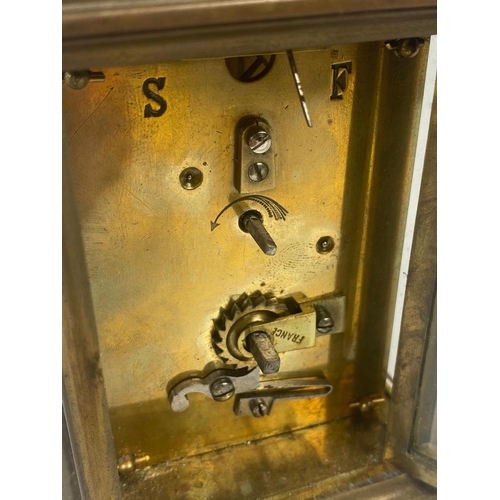 310 - Vintage carriage clock with 4 other modern clocks.