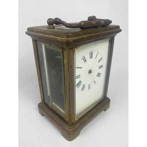 310 - Vintage carriage clock with 4 other modern clocks.