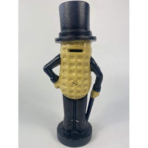 313 - Cast iron money box, Mr Peanut.  27cm