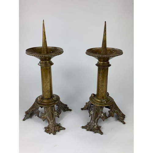 38 - Pair of mid-late 19th century French church candlesticks in the Gothic style, 40cm