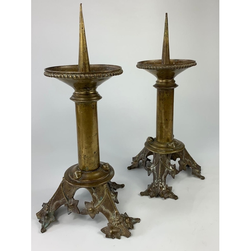 38 - Pair of mid-late 19th century French church candlesticks in the Gothic style, 40cm