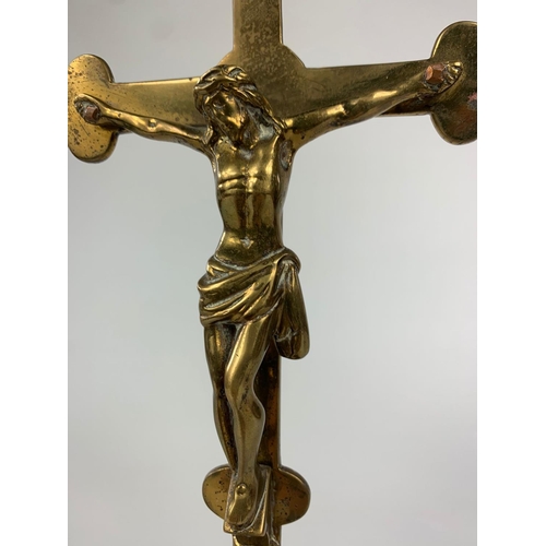 39 - Early 20th century brass crucifix, 32cm