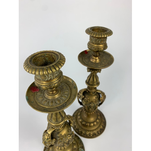 43 - Pair of late 19th century ornate candlesticks, 24cm