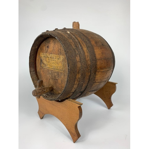 48 - Small early 20th century oak barrel on stand, 28cm