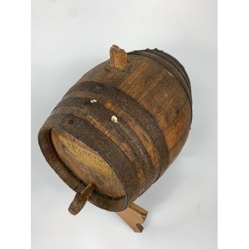 48 - Small early 20th century oak barrel on stand, 28cm