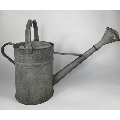 61 - Large early 20th century watering can, 44cm