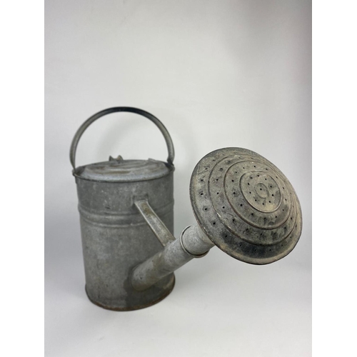 61 - Large early 20th century watering can, 44cm