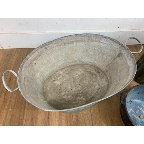 594 - Large galvanised tub, Gerry can and cast iron pot