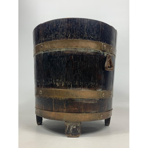 86 - Early 20th century oak brass bound bucket, 38cm