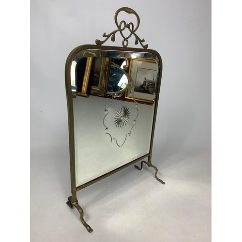 97 - Vintage brass framed fire screen with a bevelled mirror side, 45x75cm