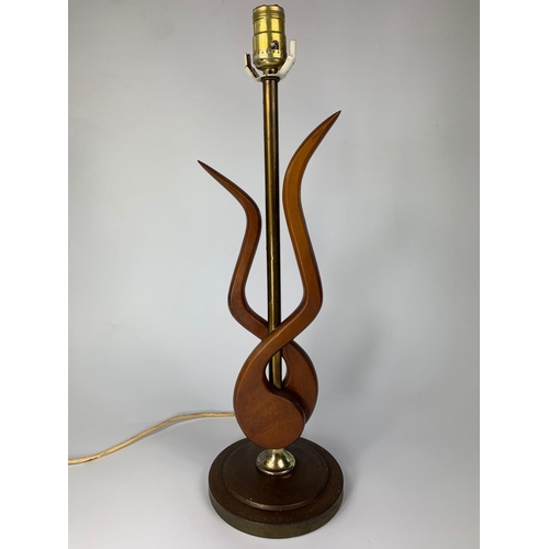 28 - Mid century teak and brass table lamp. 54cm