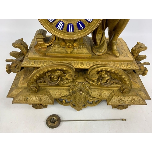 19 - Large 19th century ornate gilded brass clock by PH Mourey. 53cm x 59cm