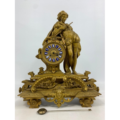 19 - Large 19th century ornate gilded brass clock by PH Mourey. 53cm x 59cm