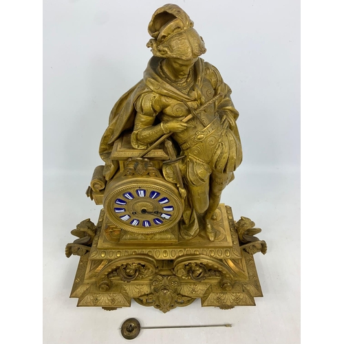 19 - Large 19th century ornate gilded brass clock by PH Mourey. 53cm x 59cm