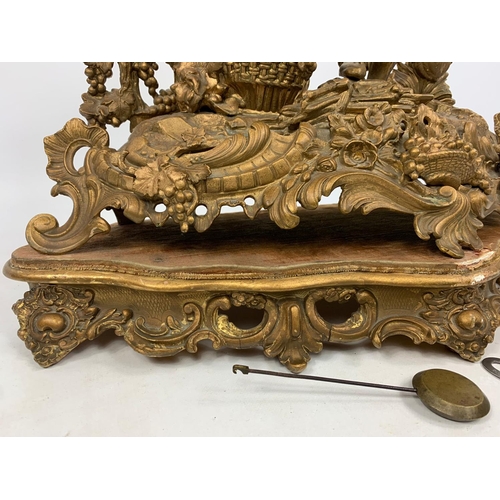 22 - Large 19th century gilded brass clock, 51cm x 51cm