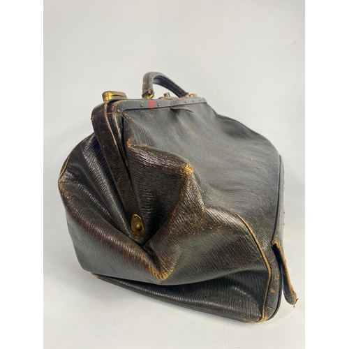 34 - Early 20th century leather midwives bag, 50cm