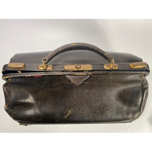 34 - Early 20th century leather midwives bag, 50cm