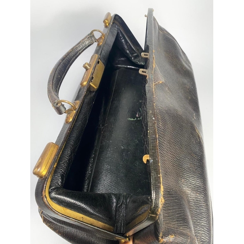 34 - Early 20th century leather midwives bag, 50cm