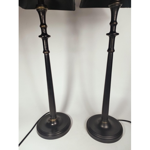 44 - Pair of black lamps, 77cm