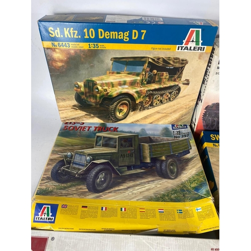 110 - Military models of tanks, trucks etc