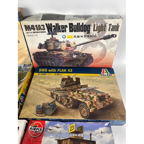 110 - Military models of tanks, trucks etc