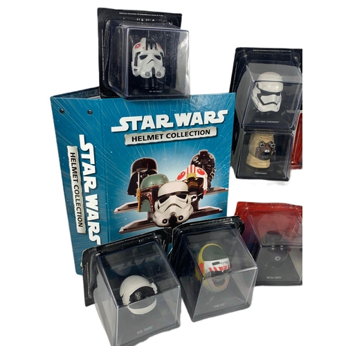 66 - Star Wars cased helmets with book