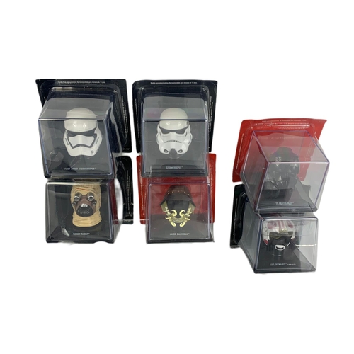 66 - Star Wars cased helmets with book