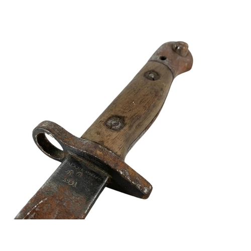 101 - Early 20th century British bayonet. Dated 1907. 54cm