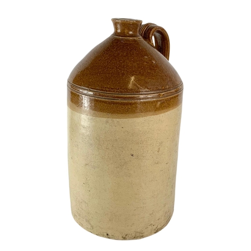 105 - Large early 20th century stone jar with with handle. 50cm