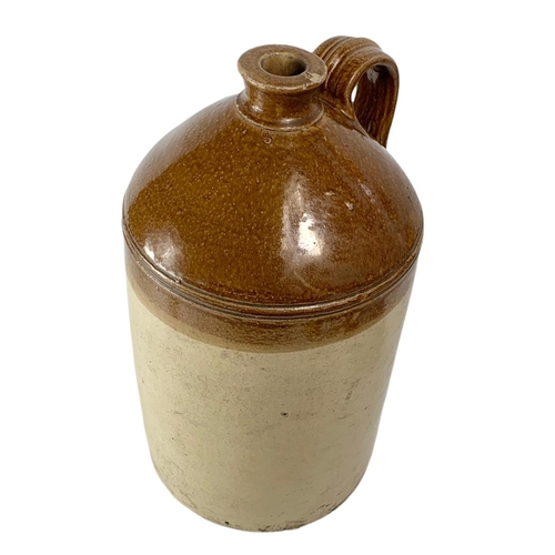 105 - Large early 20th century stone jar with with handle. 50cm