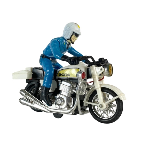 126 - Vintage 1960’s Hong Kong battery operated police motorcycle. 20/16cm