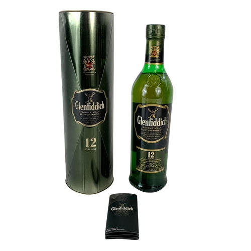 13 - Glenfiddich single Malt Scotch Whisky in tin. 12 years old.