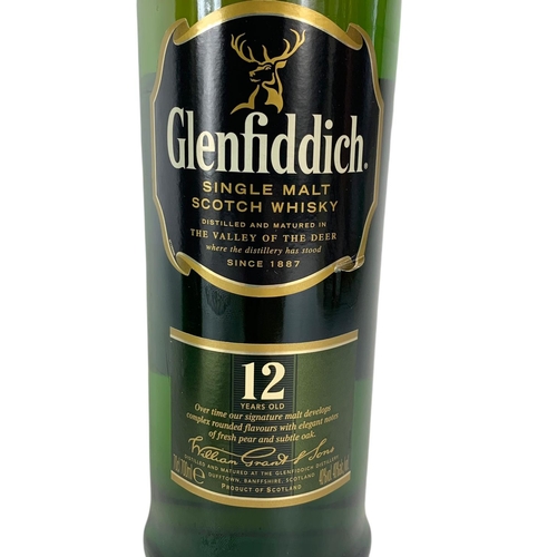 13 - Glenfiddich single Malt Scotch Whisky in tin. 12 years old.