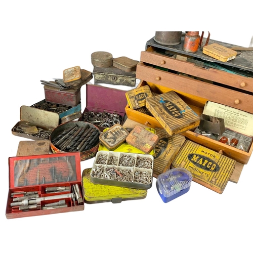 131 - Tool box and contents, including old tins, screws, bolts etc.