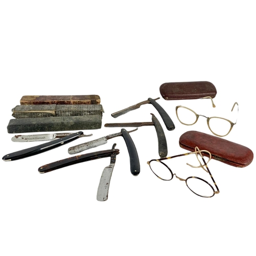 138 - 2 pairs of vintage spectacles and early 20th century cut throat razors