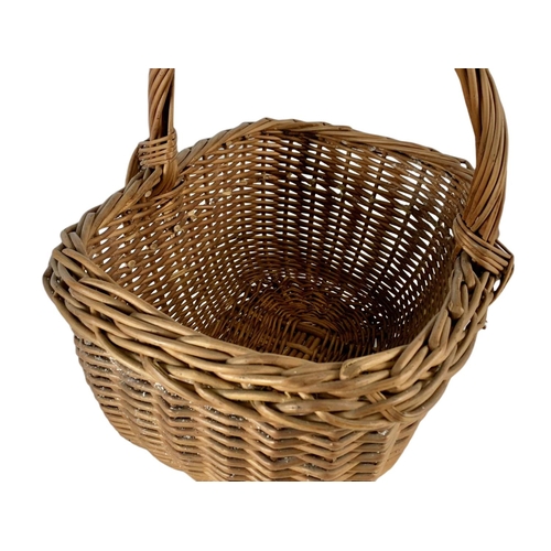 140 - 2 vintage wicker baskets. 37cm