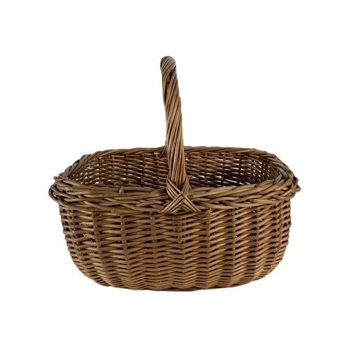 140 - 2 vintage wicker baskets. 37cm